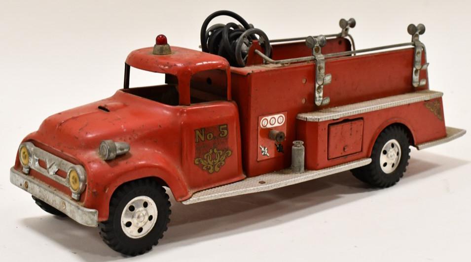 Tonka Round Fender Suburban Pumper #5 Fire Truck: Original Tonka round fender suburban pumper #5 fire truck. It is missing the ladder and two hoses. Comes with the booster hose. Good condition with paint loss and wear from play and age. Measures appr