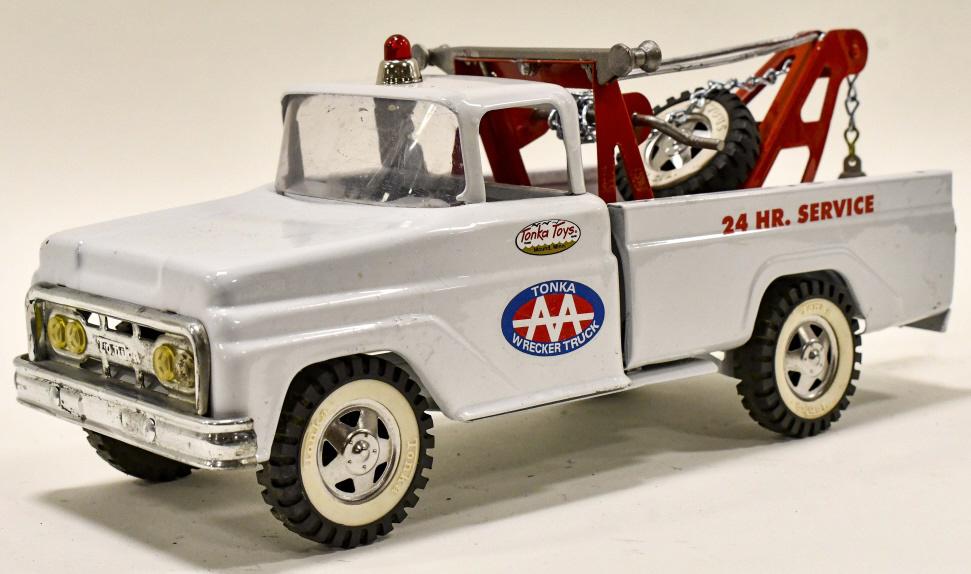 Restored Tonka AA Wrecker 24 HR. Service Tow Truck: Restored Tonka AA wrecker 24 hour service tow truck. Good condition with a couple paint chips and light wear from storage and display. Measures approximately 14" long.