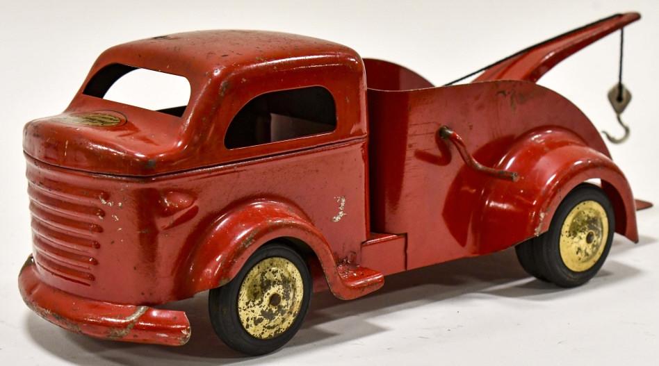 Original Richmond Wrecker Tow Truck: Original Richmond Scale Model Toy tow truck. Good condition considering age. Does have some paint loss and wear from play and age. Displays nicely. Measures approximately 12 1/2" long.