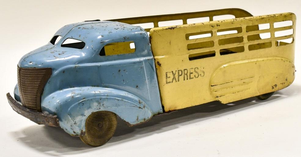Wyandotte Express "Shark Nose" Truck: Original Wyndotte Express shark nose truck. The truck was originally a tow truck, but it is missing the tow boom. The truck has paint loss and wear from play and age. Measures approximately 21" long.