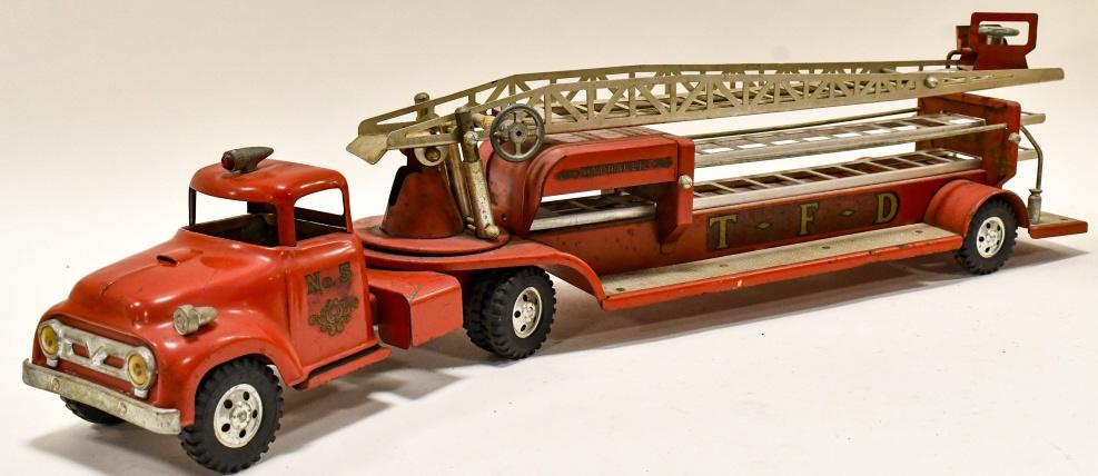 Tonka No. 5 Round Fender Aerial Ladder Fire Truck: Original Tonka No. 5 round fender aerial ladder fire truck. Good condition with paint loss, dust, and wear from storage and age. Will clean up nicely. Measures approximately 31" long.