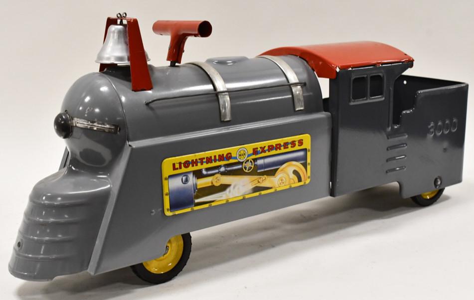 Marx Lightning Express Ride On Locomotive: Marx Lightning Express ride on locomotive #3000. Good condition with some paint chips and light wear from age and display. Displays well with good graphics and bell. Measures approximately 26" long.