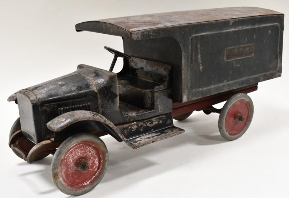 Original Buddy L Express Line Truck: Original Buddy L Express Line truck. The truck has paint loss, surface rust, and wear from play and age. Displays well with good patina. Measures approximately 25"