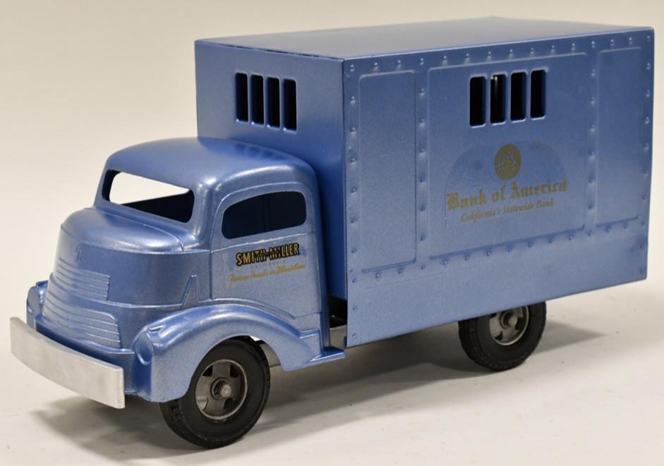 Restored Smith Miller Bank Of America Truck: Restored Smith Miller Bank of America armored truck. Displays well painted in a light blue. Good condition with some scuffs and wear from storage and display. One of the door hinges was glued on. Meas