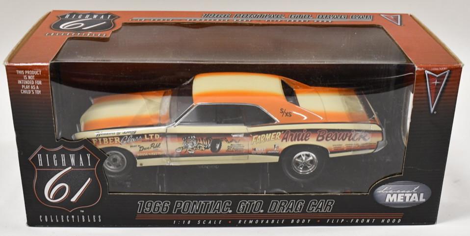 1/18 Highway 61 1966 Pontiac GTO Drag Car: 1/18 scale Highway 61 Die-Cast Promotions 1966 Pontiac GTO drag car Arnie Beswick "Farmer". Good condition new in the box.
