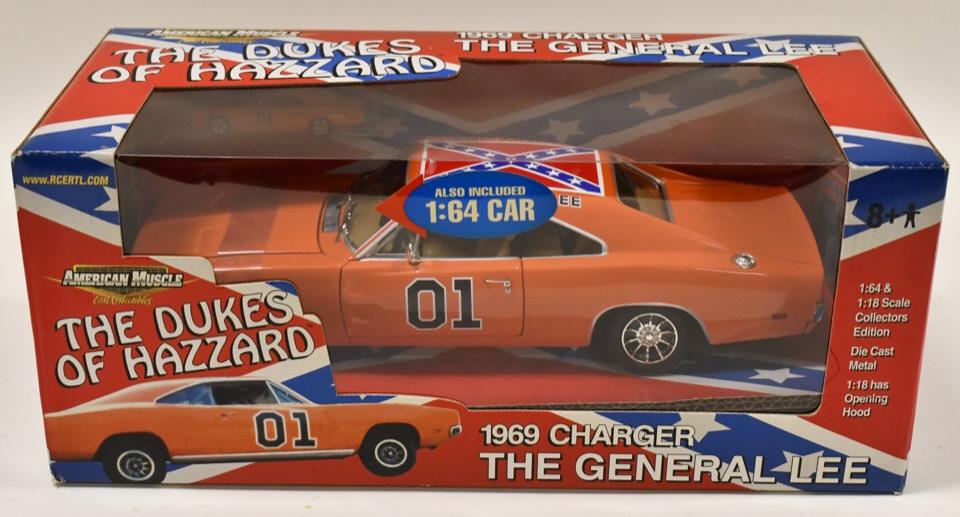 1/18 Ertl RC2 1969 Charger The General Lee: 1/18 scale Ertl RC2 American Muscle die-cast The Dukes Of Hazard General Lee 1969 Dodge Charger. Also includes a 1/64 scale version of the car. Good condition new in the box.