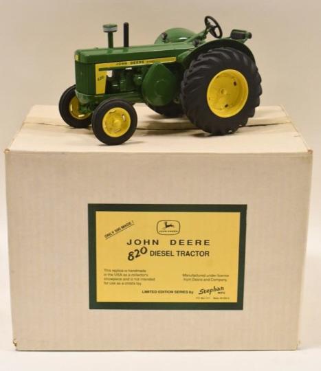 1/16 Custom Stephan John Deere 820 Diesel Tractor: 1/16 scale custom Stephan MFG John Deere 820 diesel tractor. The tractor has a paint chip on the fender, and the steering shaft is broke. Only 500 of these made. These are hard to find, especially thi