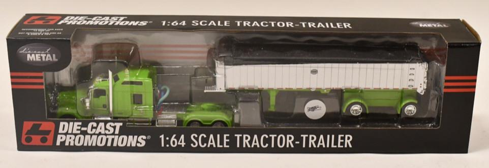 1/64 DCP Kenworth W900 w MAC Coal Dump Trailer: 1/64 DCP Kenworth W900 with 86" sleeper and spread-axle MAC coal dump trailer. Good condition in the box. Item no. 33363.