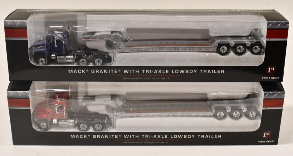 (2) 1/64 1st Gear Mack Granite w/ Tri-Axle Lowboys: (2) 1/64 1st Gear Mack Granite with tri-axle lowboy trailer. Good condition in the boxes.