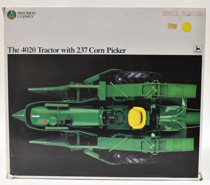 1/16 Ertl John Deere 4020 Tractor w Corn Picker: 1/16 scale Ertl precision #14 John Deere 4020 tractor with 237 corn picker. Good condition in the box.