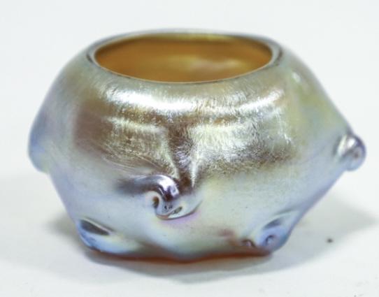 Louis C. Tiffany Favrile Pigtail Open Salt Cellar: Outstanding Louis Comfort Tiffany Platinum Hued Gold Favrile Pigtail Open Salt Cellar. The cellar measures 2-1/8" across x 1-14" tall. The salt is marked L.C.T. R8262 on the base. Great condition with