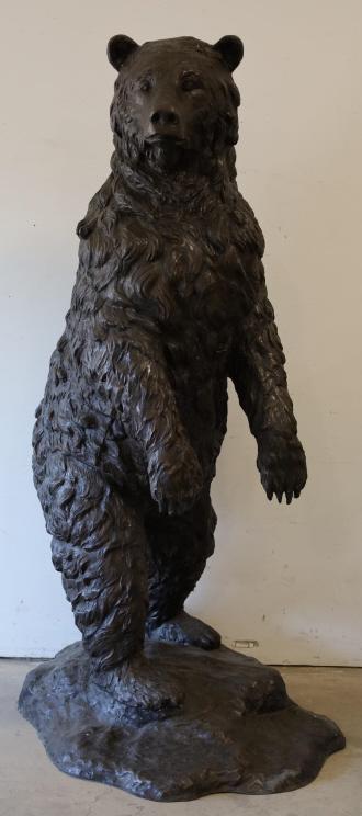 Life-Size Standing Bear Bronze Statue: 75" tall life-size bronze statue featuring a standing bear. The statue is in great condition and has very nice detail. Measures approx. 40" across at the base.