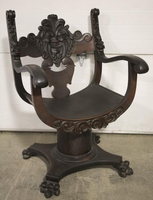1900's Carved Wood North Wind Face Chair: 1900's carved wood north wind face savanarola chair. Displays well with carved faces and claw feet. Good codition with wear from use and age. Measures approximately 37-1/2" tall by 24" across by 27" d