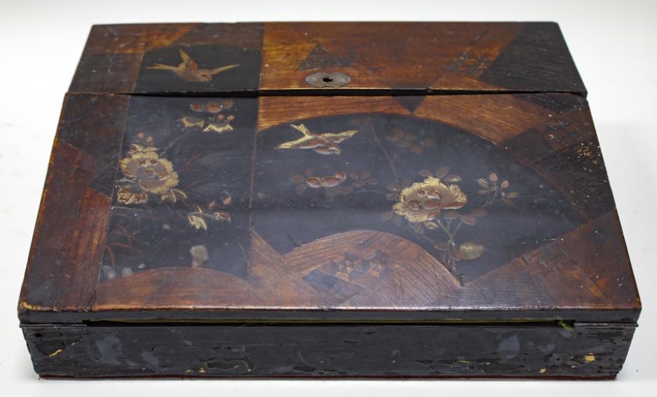Antique Black Lacquer W/Birds Travel Writing Desk: Nice antique black lacquer and inlaid wood writing desk with a bird and flower design. The desk is in good antique condition with some paint loss and scrathes, has interior compartments. Measures 4-1/