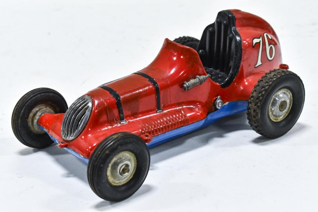 Vintage Roy Cox Thimble Drome Champion #76 Racer: Vintage Roy Cox Thimble Drome Champion #76 racer. The racer has areas that have been touched up. The racer has paint loss and wear from play and age. Measures approximately 9 1/2" long.