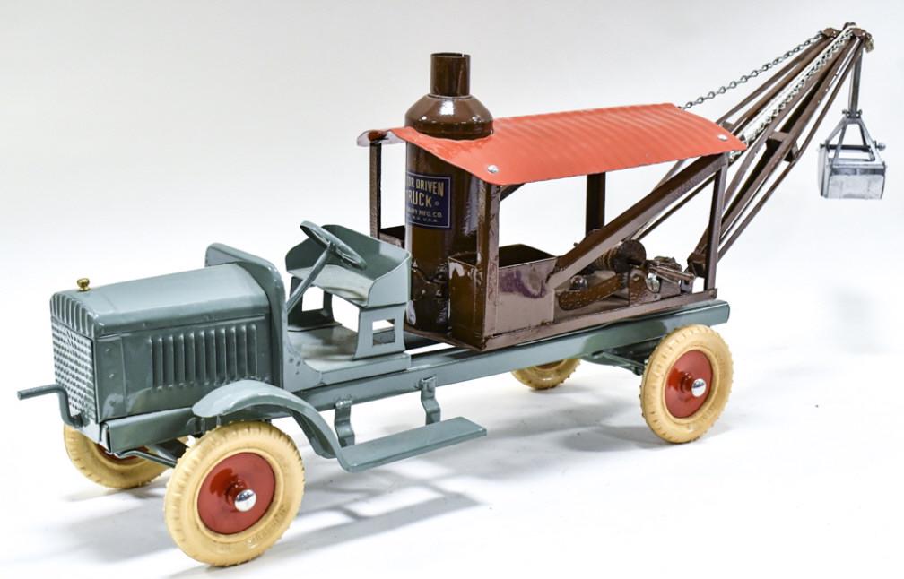 Custom Kingsbury Steam Shovel Truck: Custom Kingsbury steam shovel truck. Displays well with clamshell bucket, boiler, and Kingsbury wheels. Good condition with a new paint job. Does have some light wear from storage and display. Measure