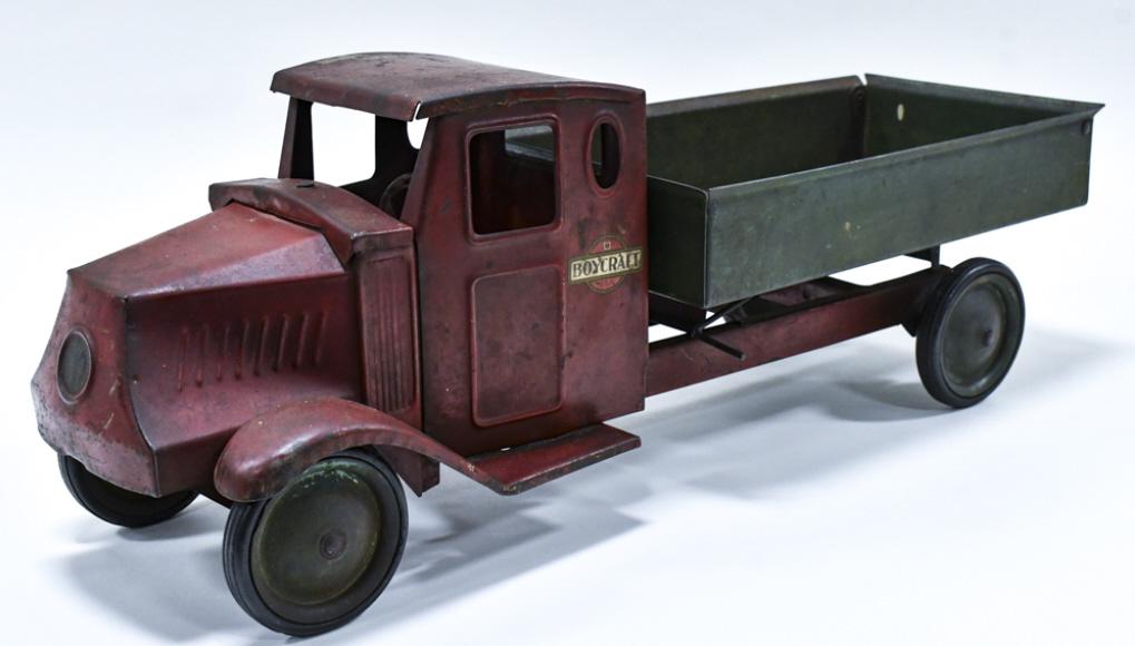 Original Early Steelcraft Boycraft Mack Dump Truck: Original early Steelcraft Boycraft Mack dump truck. Boycraft was made by Steelcraft for a toy line only to be supplied at Sears-Roebuck. The truck is in good original condition with paint loss and wea