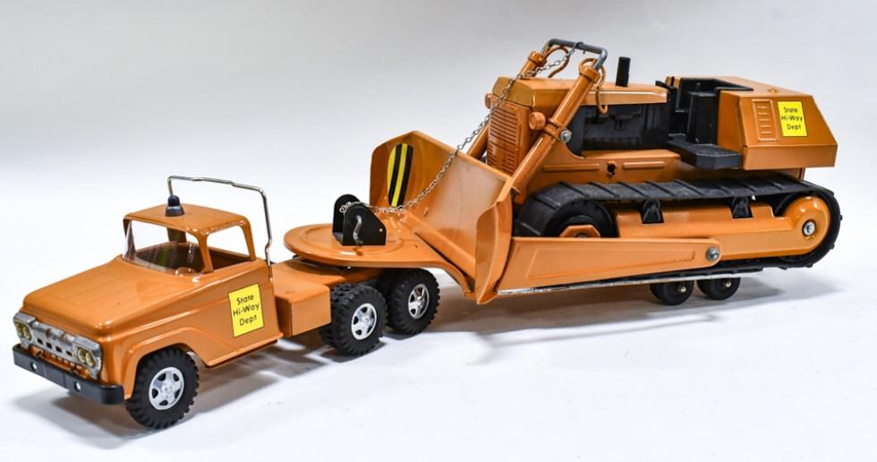 Custom Tonka State Hi-Way Dept Lowboy w Dozer: Custom Tonka State Hi-Way Dept. truck with lowboy and Mighty Tonka bulldozer. Displays well with a nice paint job, custom extended trailer, and headache rack. Good condition with light wear from stora