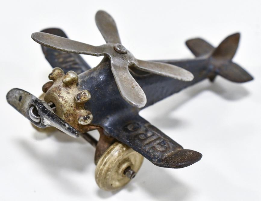 Hubley Cast Iron Gyro Plane: Hubley cast iron Gyro plane. The plane displays well with rotating propellor and rotor. The plane is in good condition with paint loss and wear from play and age. Measures approximately 4-1/2" long.