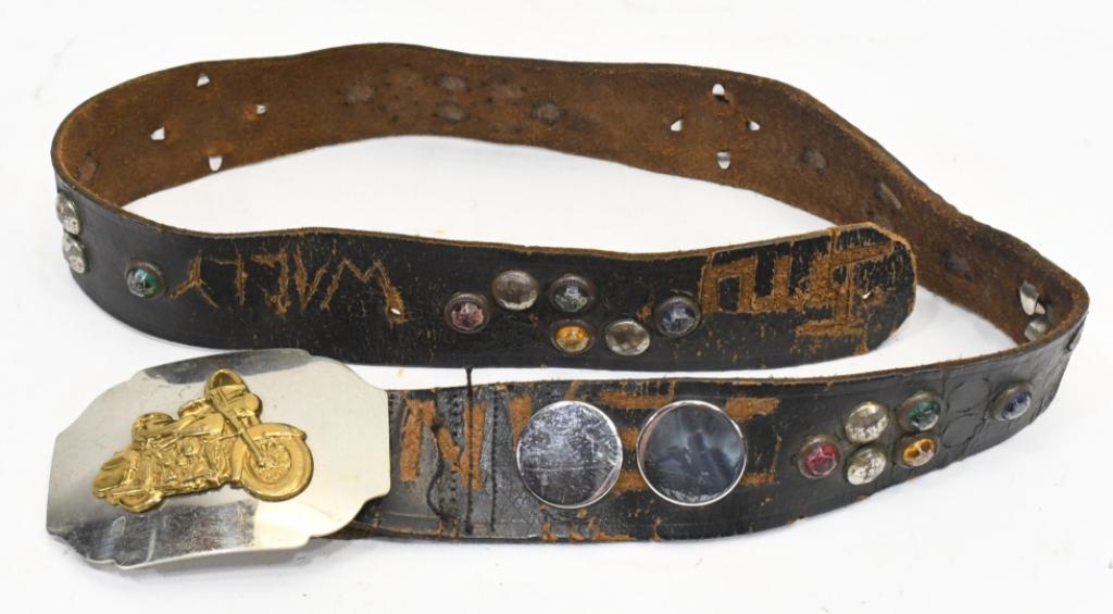 1950s-60s Leather Motorcycle / Rockabilly Belt: Unique 1950s-1960s leather motorcycle / rockabilly style jeweled and studded belt. Belt is in fair condition with damage and wear from use and age. Displays very well with multi-colored jewels, studs,
