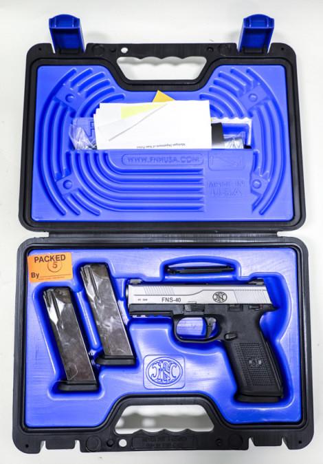 FNH USA FNS-40 .40 S&W Semi-Automatic Pistol NIB: New in case FNH USA Model FNS-40 semi-automatic pistol in .40 S&W. The stainless & black pistol is in great condition and has a 3-7/8" barrel. Comes with the original hard plastic case, lock, instruct