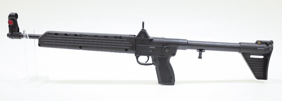 Kel-Tec Sub 2000 9mm Semi-Automatic Carbine: Kel-Tec Sub 2000 semi-automatic carbine in 9mm. The folding carbine is in nice condition and has a 16.1" barrel, missing magazine. SN: 09476. FFL required for transfer. (877-6)