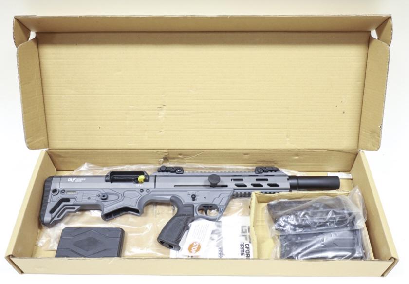 GForce GFY-1 12 Ga. Mag Fed Bullpup Shotgun NIB: GForce Arms Model GFY-1 magazine fed tactical bullpup shotgun in 12 gauge. The gray cerakote shotgun is in new unfired condition in the original box with instructions, two magazines, and extra chokes.