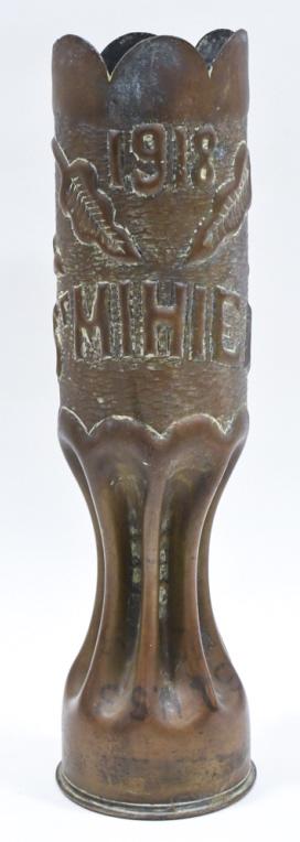 WWI 1918 St Mihiel Trench Art Artillery Shell: Highly detailed WWI 1918 St Mihiel trench art artillery shell. Shell is marked on the botthom " 75 DEC MGM 351 18 BX" . Has wear from age, storage, and display. Measures approximately 12-1/2" tall by