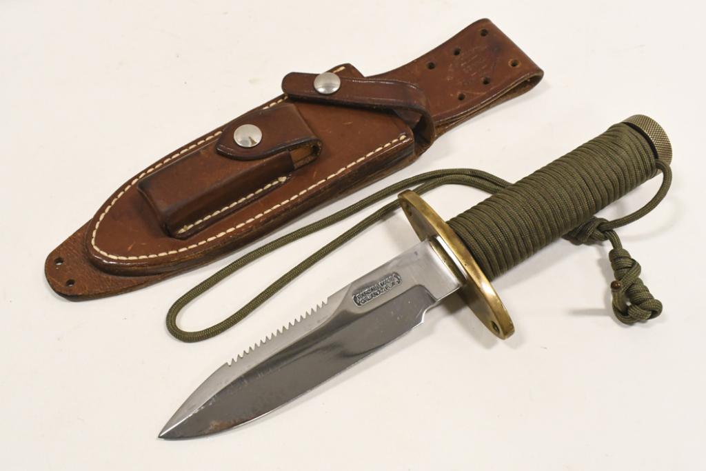 Randall Made Model 18 Attack Survival Knife: Randall Made " Attack Survival " Model 18 fixed blade knife with metal keep safe handle and Randall Made leather sheath. Appears to be in good condition with wear from use and age. Includes Randall le