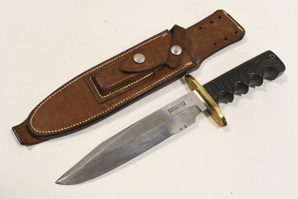 Randall Made Model 14 Attack Fixed Blade Knife: Randall Made fixed blade model 14 " Attack " knife with Micarta handle and leather sheath. Appears to be in nice condition with wear from use and storage. Includes Randall leather sheath. Overall it m