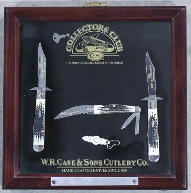 2002 Case XX Collectors Club Knife Collection: Lot of three 2002 Case XX Collectors Club folding knives with Case Collectors club glass / wood display case. Lot includes (2) Burnt Moss Bone Cheetah 6111-1/2 L folding knives, a Burnt Moss Seahorse