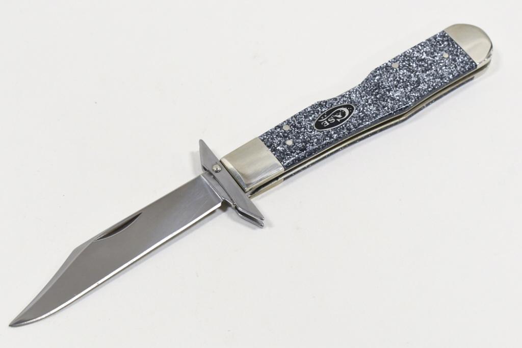 Case XX Stardust 10111 -1/2 Cheetah Folding Knife: Case XX Cheetah model 10111-1/2 Stardust folding knife. Appears to be in nice condition with light wear from display and use. When closed it measures approximately 4-3/8" across.