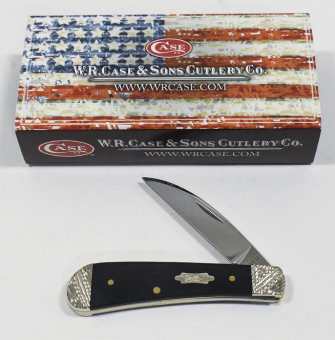 Case XX TB71117 Sway Back Folding Knife w Box: Case XX Sway Back style folding knife model no. TB71117 with ebony wood grips and box. Knife appears to be in nice condition with light wear from use and storage. When closed it measures approximately