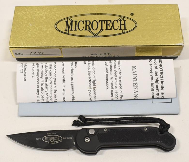 Microtech UDT Automatic Folding Knife w/ Box: Microtech U.D.T. automatic folding knife with box. Knife appears to be in nice condition with some light wear from use, age, and storage. Action works well. When closed it measures approximately 3-1/4