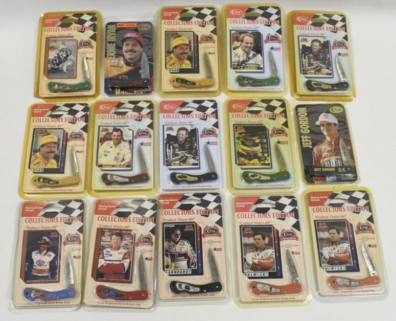 (15) Case XX Nascar Collector's Edition Knives: Lot of 15 Case XX Nascar Collector's edition folding knives in original packaging. Knives all appear to be new old stock and never used. Packaging has yellowing and damage from age and storage.