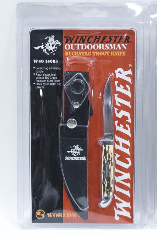 (3) Winchester Buckstag Trout Knives: Lot of three Winchester Outdoorsman Buckstag Trout fixed blade knives. All three appear to have never been used and are in original packaging. Knives measure approximately 6-1/8" across.