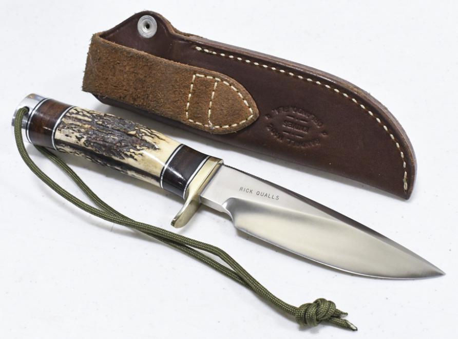 Randall Made Model 25 Trapper Fixed Blade Knife: Randall Made " Trapper " Model 25 fixed blade knife with Randall Made leather sheath. Appears to be in nice condition with some wear from use and storage. Blade is marked " Rick Qualls". Overall it me