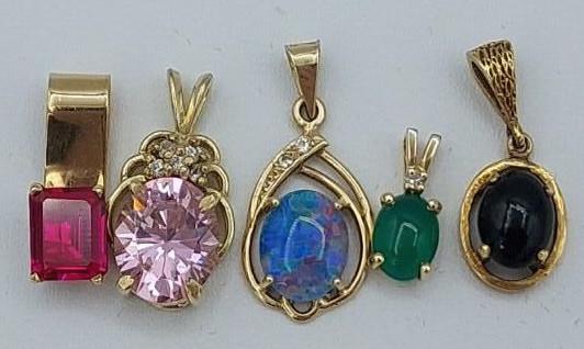 Five (5) 14K Yellow Gold Pendants W Various Stones: 14K yellow gold pentants with Jade, Opal, Onyx, Ruby and Pink Sapphire stones. Length all under one inch, total weight 9.2 grams