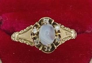 14K Rose Gold Moonstone Ring: 14K rose gold moonstone ring. Size 6, total weight 2.3 grams.