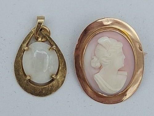 Two (2) Ladies 10K Gold Pendants: Two 10K gold pendants. One 10K rose gold shell cameo brooch pendant, 1 inch long. One 10K yellow gold opal pendant, .875" long. Total weight 5 grams.