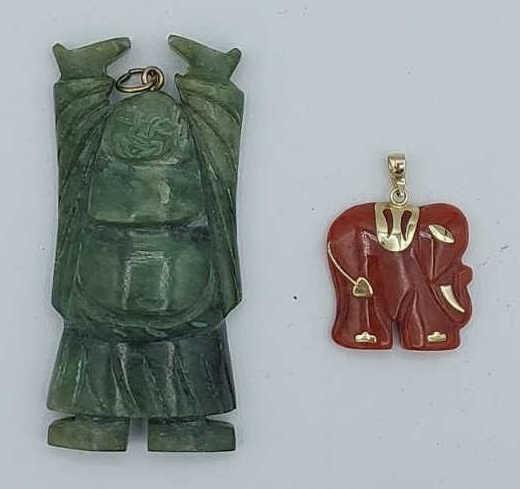 14K Yellow Gold Red Jasper & Jade Carved Buddha: 14K yellow gold carved red jasper stone elephant and Jade carved Buddha. Elephant length 1.125", Buddha length 2.25"