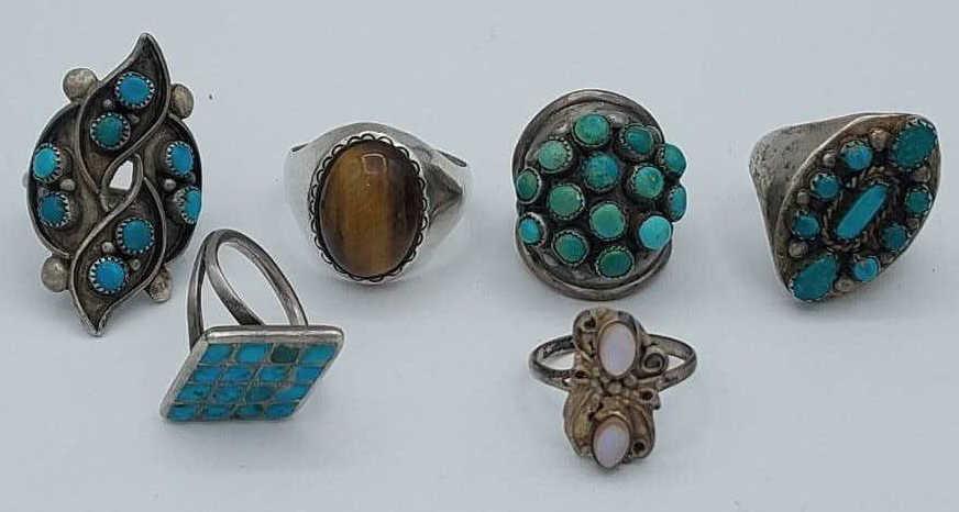 Sterling Silver Set of Six (6) Multi Stone Rings: Sterling silver set of six turquoise and tigers eye rings. Sizes 5-13, total weight 50.1 grams.