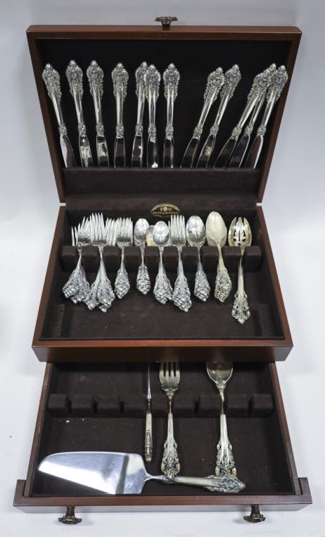 66 Pc. Wallace "Grand Baroque" Sterling Set: 66 Pc. Wallace sterling silver flatware set in the "Grand Baroque" pattern. Set includes (12) dinner knives, (12) dinner forks, (12) salad forks, (12) teaspoons, (1) hollow handle master butter spread