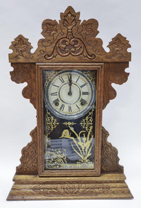 Antique Sessions Wood Mantel Clock: Antique Sessions wood mantel clock. Paper face has wear. Made in USA. Measures 15.5" across, 22.5" tall, 5" deep.