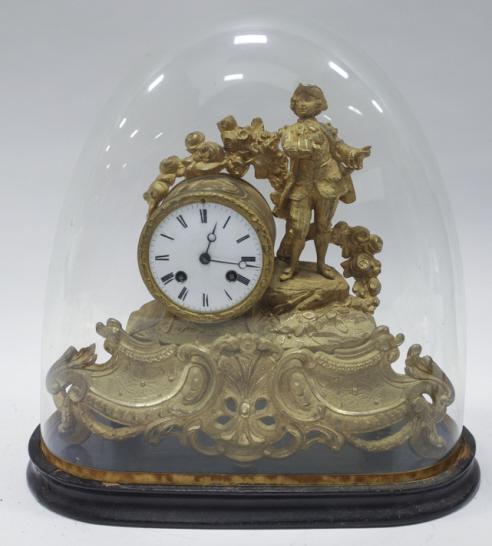 Antique French Gilt-Metal Mantel Clock Under Glass: Antique French gilt-metal mantel clock Under glass dome. Circular enamel dial. With pendulum and key. Measures 14" across, 14" tall, 6" deep with dome.