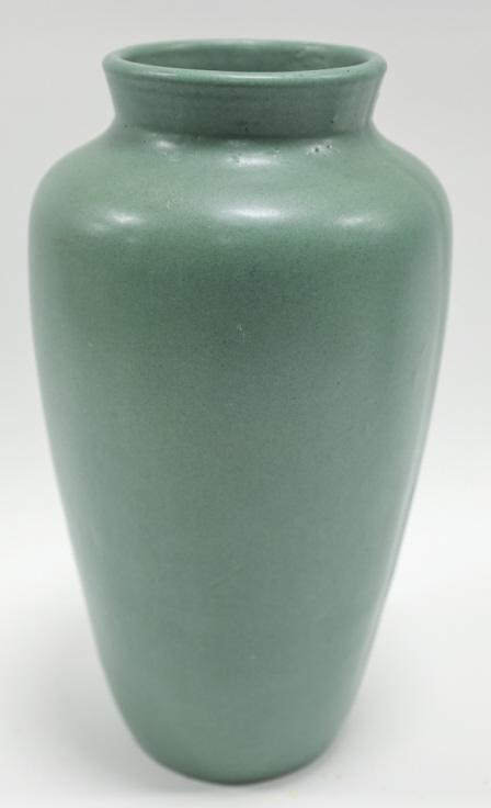 Teco Pottery Arts And Crafts Vase: Teco Pottery Arts And Crafts Vase with a matte green finish. Marked on base with 07. Nice condition. Measures 7" across x 12" tall