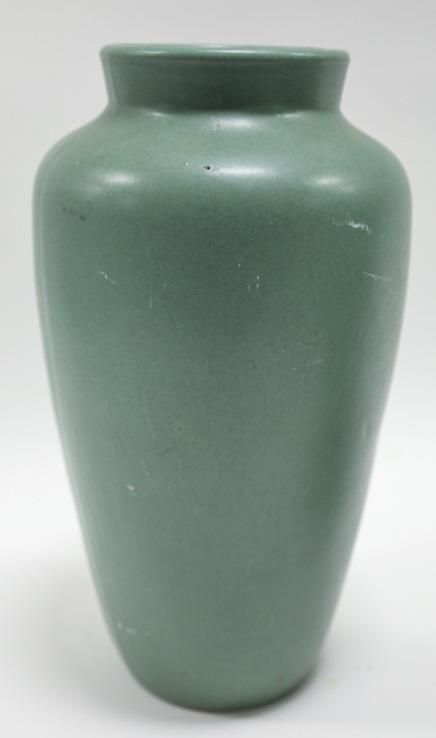 Teco Pottery Arts And Crafts Vase: Teco Pottery Arts And Crafts Vase with a matte green finish. Marked on base with 07. Nice condition with some scuffing. Measures 7" across x 12" tall