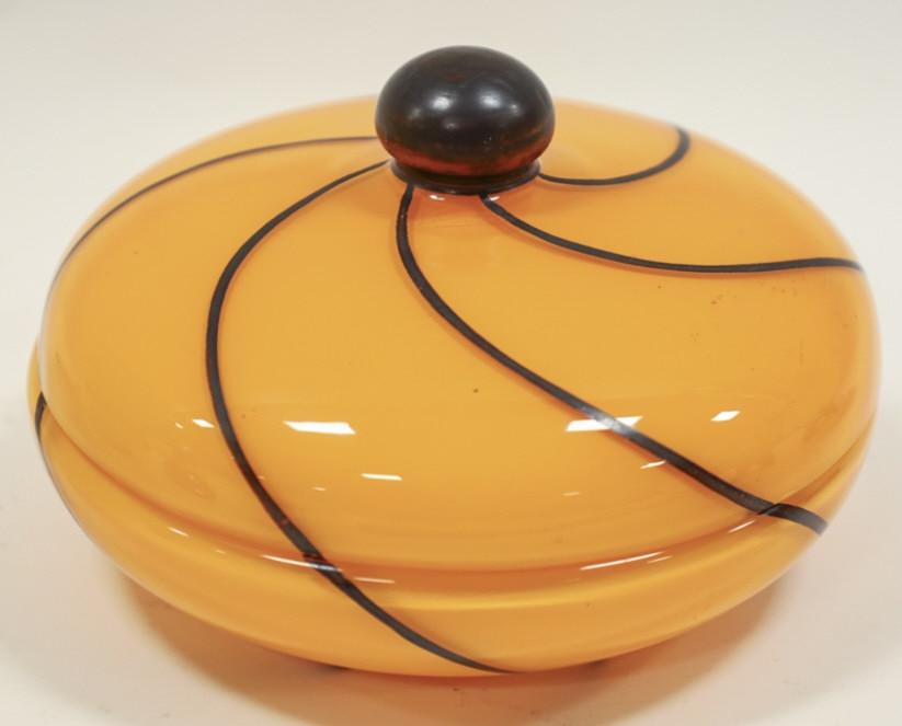 Czech Piped Art Glass Orange & Black Lidded Vessel: Czech Piped Art Glass Orange & Black Lidded Vessel. Measures 6" across, 4" tall.