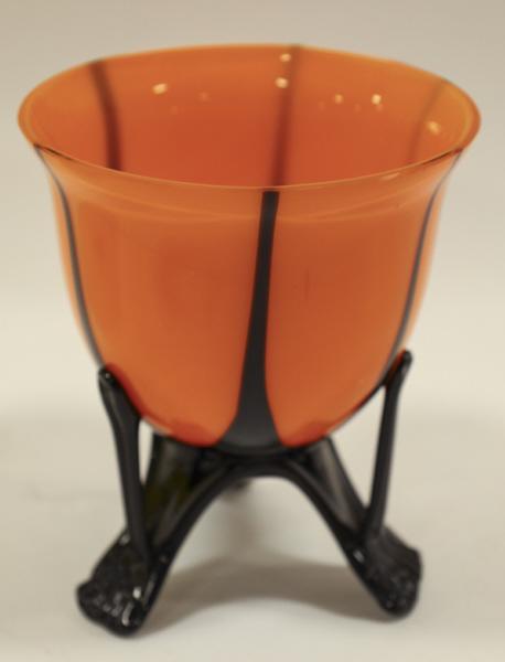 Czech Tango Art Glass Orange & Black Footed Bowl: Czech Tango Art Glass Orange & Black Footed Bowl. Measures 5" across, 6" tall.