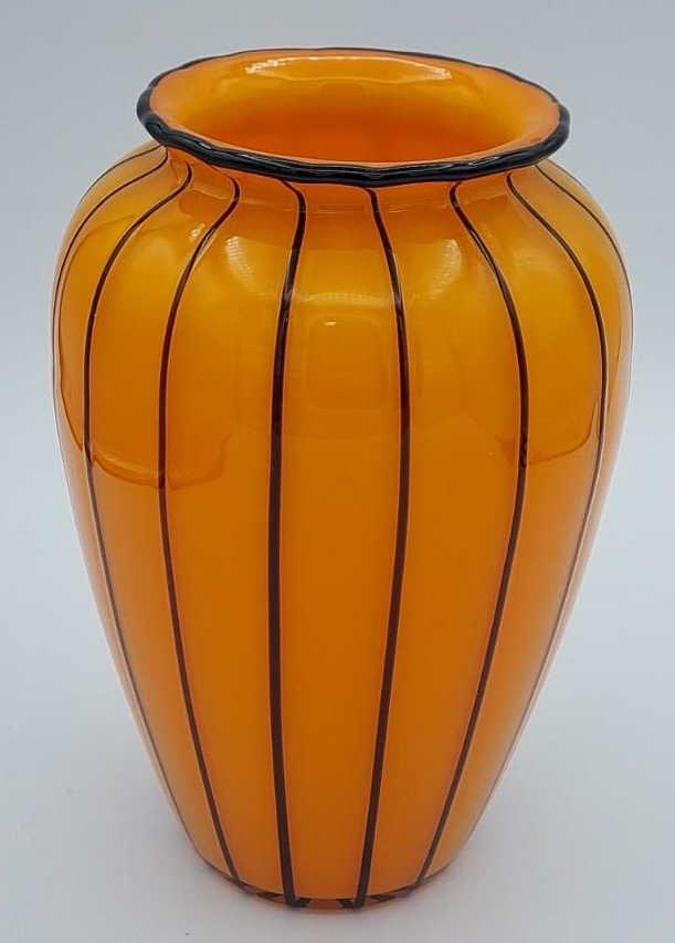 Czech Tango Art Glass Vase: Czech Tango art glass vase. Orange and black vase. Measures 5" across, 8" tall.